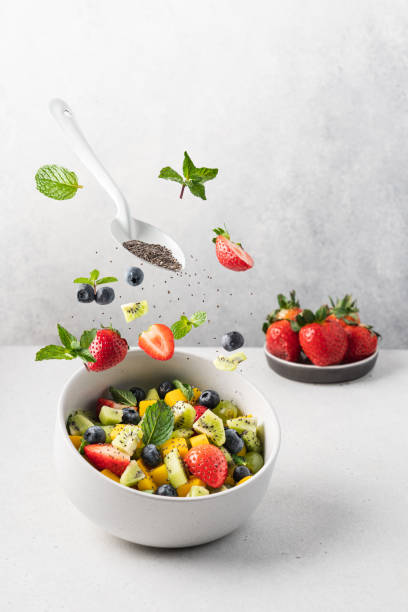 istock Levitation of tropical fruit salad. 1373264755