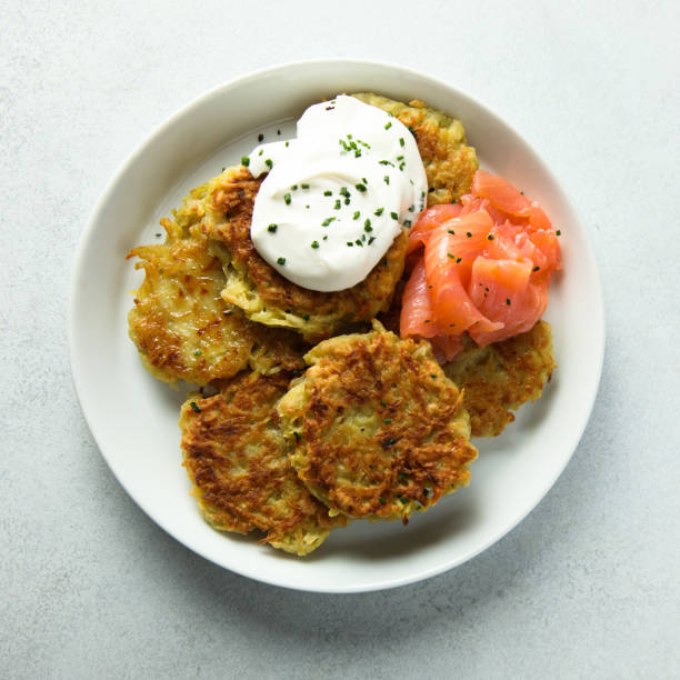 istock Potato pancakes or lakes with salmon 1373266235