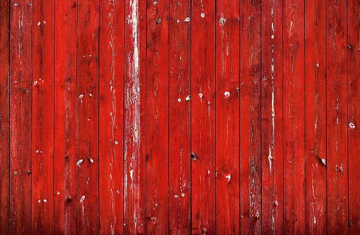 Knotted wooden wall background, painted in red color, with vintage details
