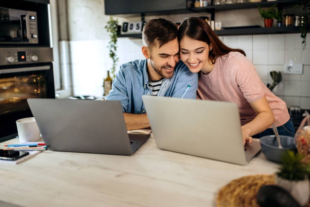 istock Young couple working from home together 1373268840