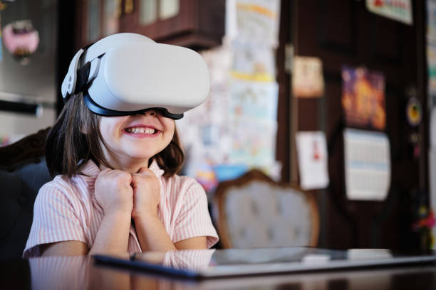 Child Having Fun Wearing Virtual Reality Headset stock photo