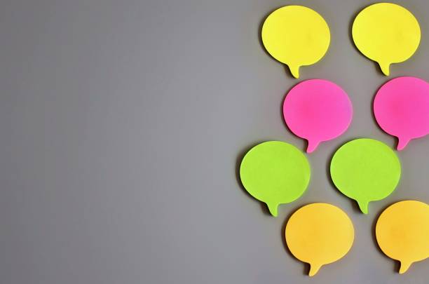 istock Colorful speech bubble on gray background with copy space 1373273152