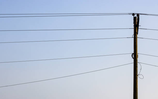istock High voltage electricity transmission pole in the urban area 1373276874