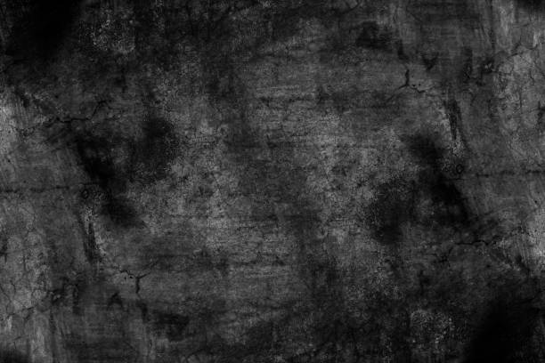 istock Black and white color aged dark cement plaster wall surface with abstract crack texture for background 1373277090