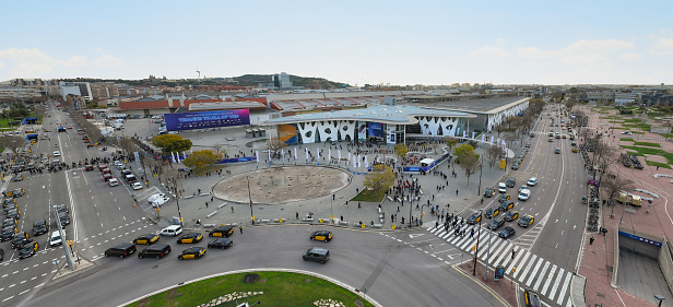 BARCELONA, SPAIN - FEBRUARY 28: Aerial video taken from the entrance of the world's largest exhibition for the mobile industry, GSMA MWC. Video recorded at the opening of the event, Monday February 28th 2022. Mobile World Congress (Footage by clicksound SL/Getty Images)