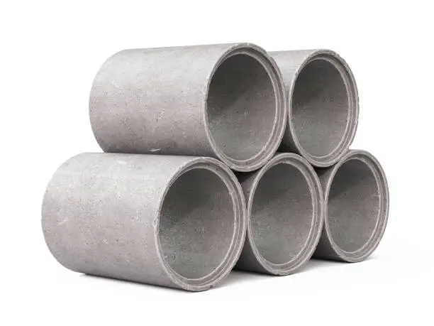 Photo of Stack of concrete pipes for building construction and pipeline isolated on white background 3d rendering