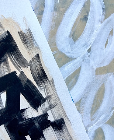 Two abstract paintings close up