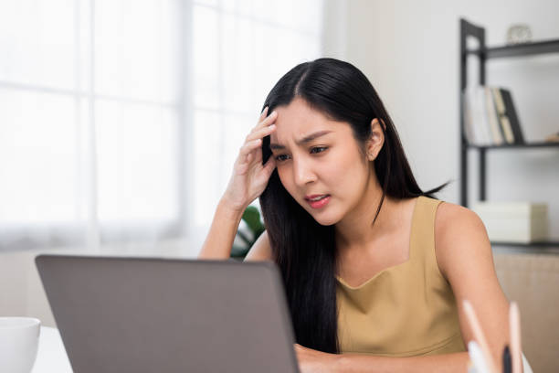 istock The girl was bored from work. She felt stressed that the work was not finished and the work was not delivered on time. don't want to work 1373287379