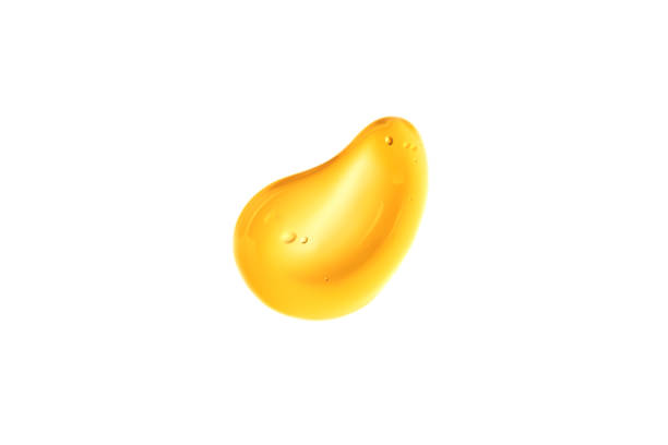 istock Cosmetic cream golden, drop liquid gel texture with bubbles on white background 1373288042
