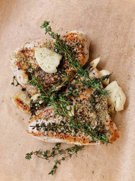 Turkey fillet baked with garlic and thyme stock photo
