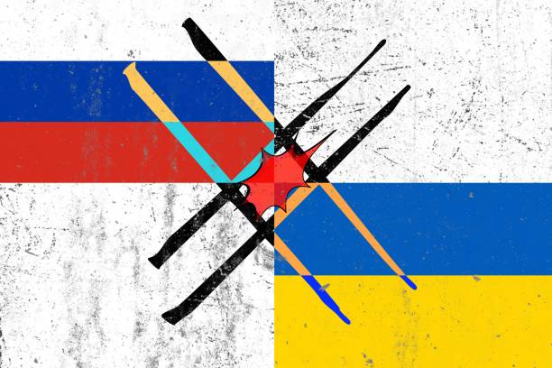 istock Ukraine Flag and Russian Flag with a fire inside concept of war 1373290325