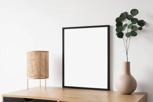 istock Artwork mock-up in interior design. Blank vertical picture frame 1373291618