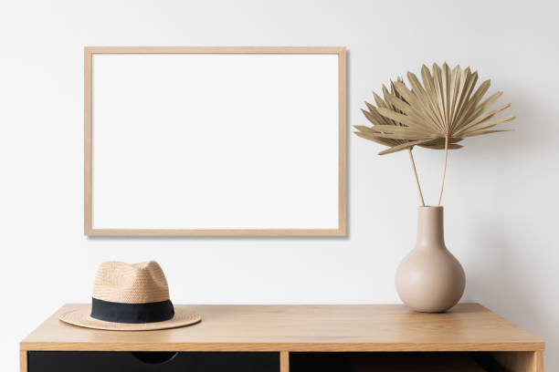 istock Artwork mock-up in interior design. Blank horizontal wooden picture frame 1373291706