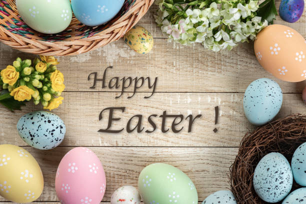 istock Easter border of decorated eggs and flowers 1373292851