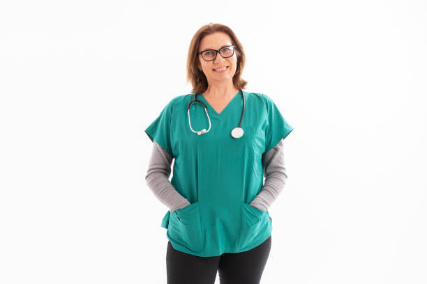 Portrait of a smiling nurse I scrubs with a stethoscope stock photo