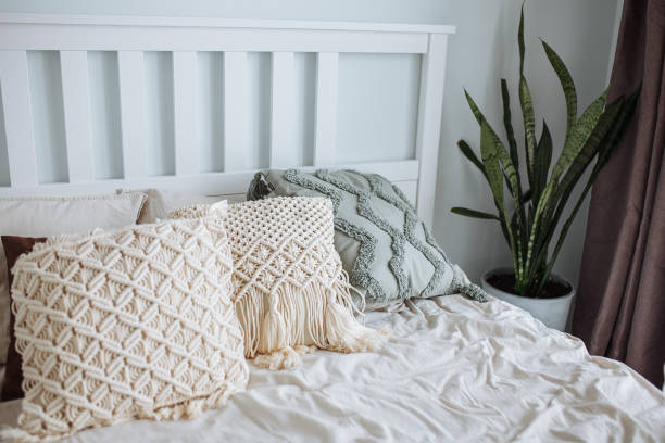 istock Bed in the bedroom with scandinavian style interior 1373295612
