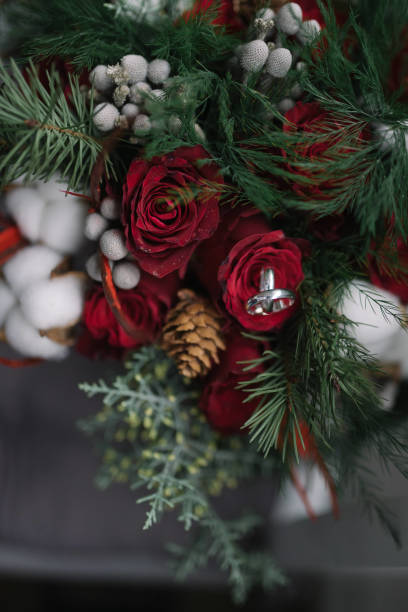 istock Wedding rings and bouquet. 1373296594