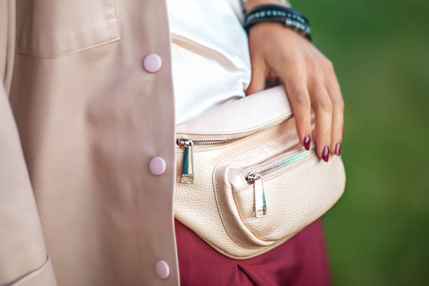 Beige belt bag made of genuine leather.