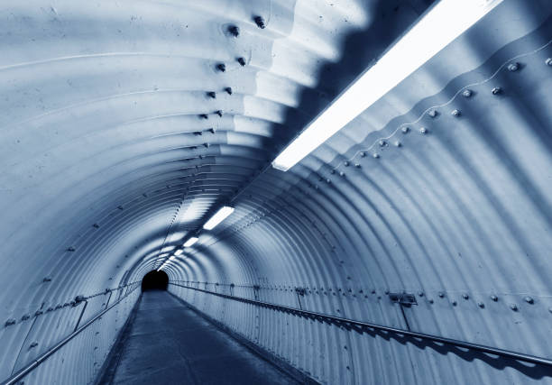 istock Empty pedestrian tunnel at night. Architecture abstract background 1373298300