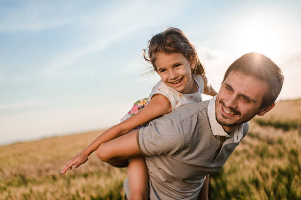 istock Father and daughter enjoying nature 1373298394