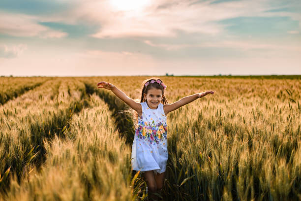 istock Happy girl enjoying nature 1373298477