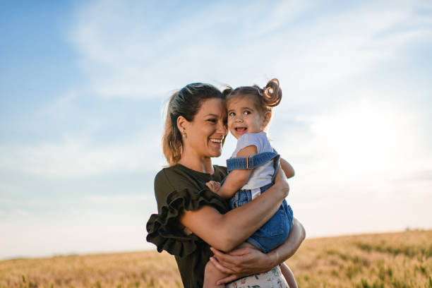 istock Single mother enjoying nature with daughter 1373298562