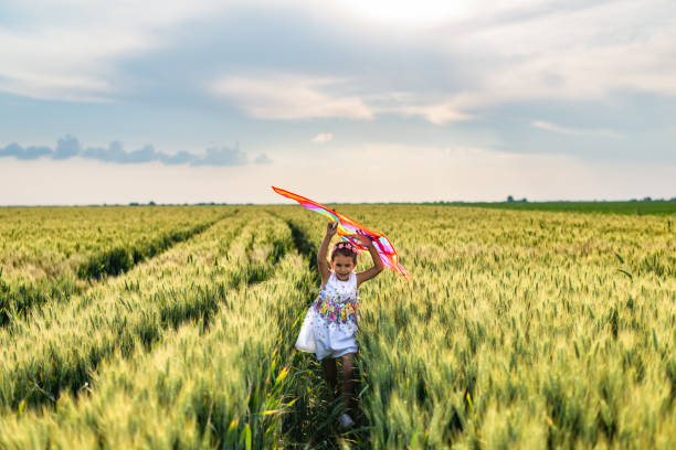istock Happy girl enjoying nature 1373298600