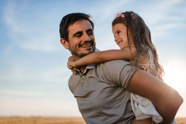 istock Father and daughter enjoying nature 1373299128