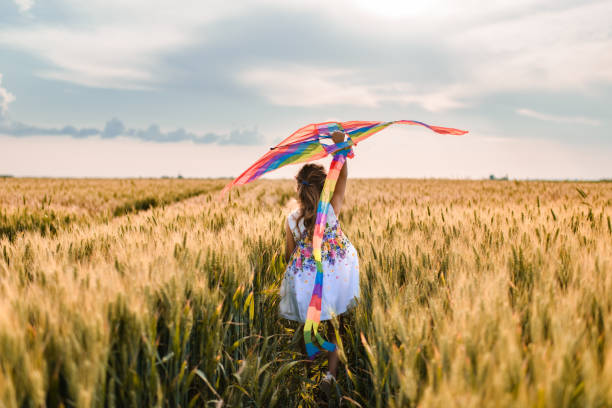 istock Happy girl enjoying nature 1373299181
