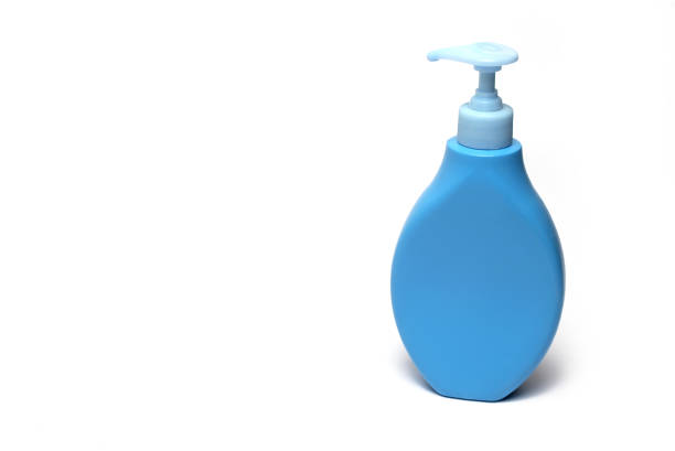 Close up of light blue soap dispenser for hygienic portioning of cream or soap on white background hand hygiene concept