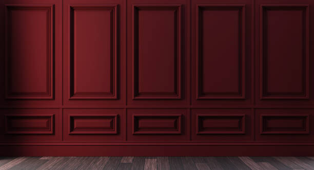 istock Classic luxury dark red empty interior with wall molding panels 1373301057