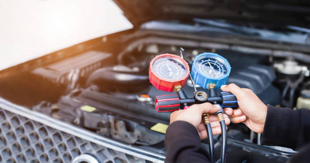istock Car air conditioner check service, leak detection, fill refrigerant. 1373304777
