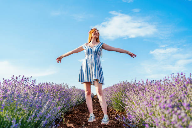 istock Young woman in a lavender field 1373306268