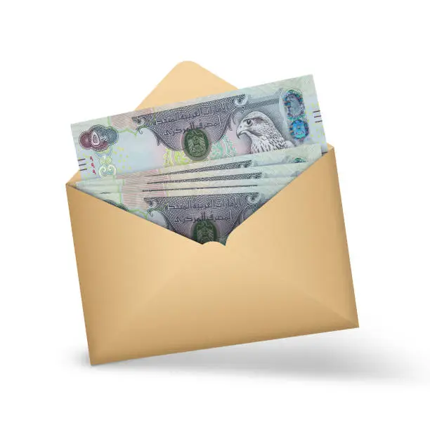 United Arab Emirates dirham notes inside an open brown envelope. 3D illustration of money in an open envelope