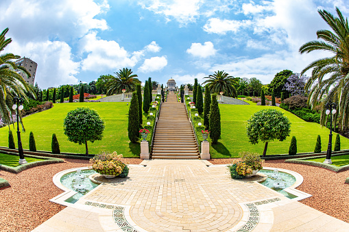 Bahai World Center. Marble staircase and garden terraces, magnificent colonnade with a gilded dome on the Mount Carmel, Haifa. Israel. The descent to the Mediterranean Sea. Clear sunny day