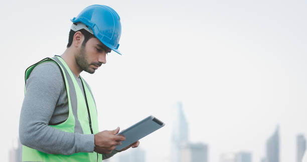 istock Smart engineer maintenance in solar power plant checking installing photovoltaic solar modules with digital tablet. Concept of sustainable resources, saving energy. 1373309065