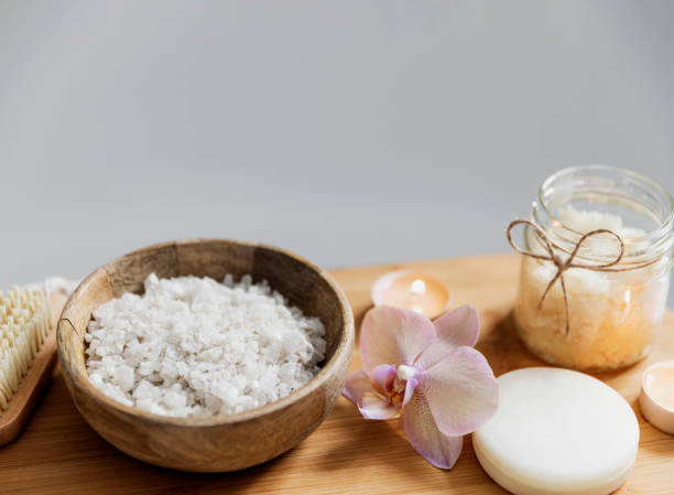 istock Hotel spa treatment or home bath procedure. Bathroom with accessories on tray 1373310612
