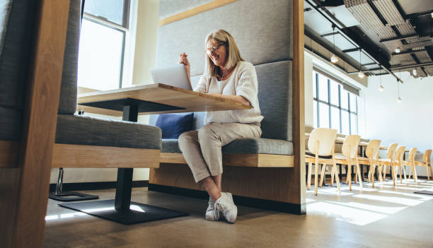 istock Mature entrepreneur having a virtual meeting in a  modern workspace 1373322937