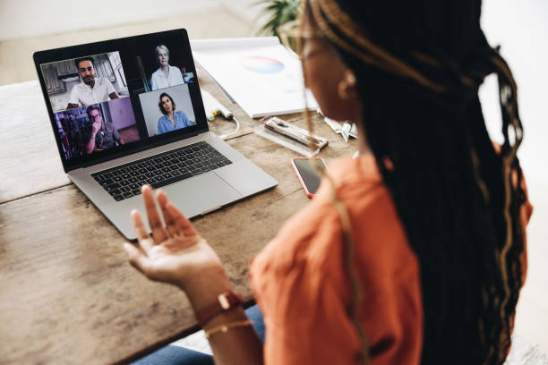 istock Designer attending a virtual meeting at her desk 1373338583