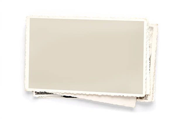 A Stack of old photo graphs with cream frames Stack of blank picture frames with clipping path for the inside photo album photos stock pictures, royalty-free photos & images