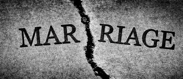 istock Broken Marriage Divorce Couple Torn Apart Destroyed Relationship Cracked Cement 1373346162