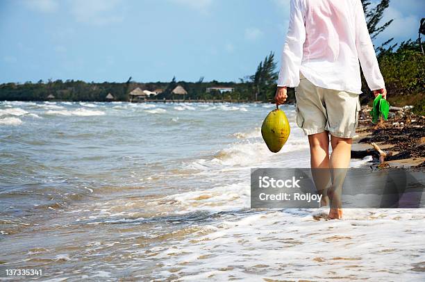 Walking Along The Beach Stock Photo - Download Image Now - Belize, Adult, Barefoot
