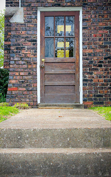 Standing at the Door stock photo