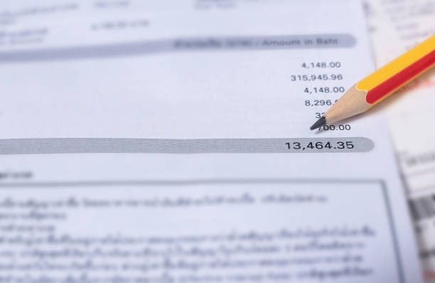 istock Utility energy bill with pencil blurred background 1373359609