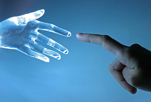 Contact Human hand touch an atrifical glass hand intelligence stock pictures, royalty-free photos & images