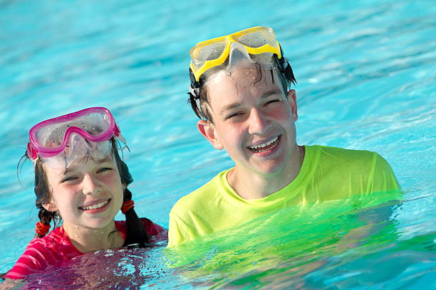 istock Happy children in pool 137336546