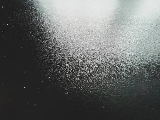 istock Very fine black leather as texture or background. 1373380853