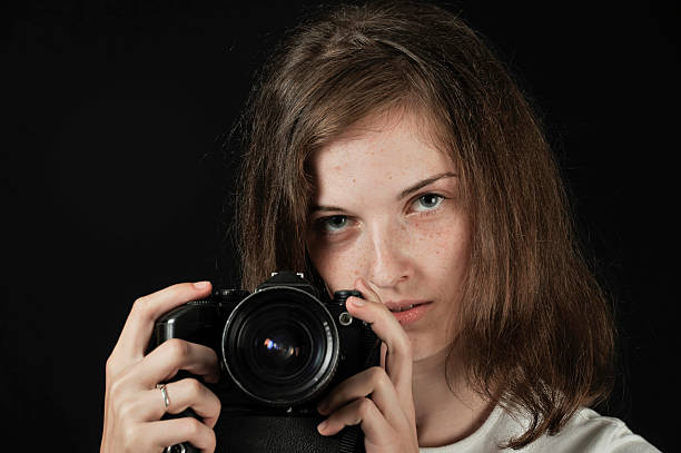 istock Female photographer 137339116