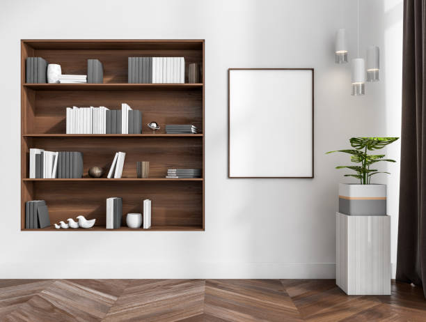 istock Bright living room interior with empty white poster, bookshelves 1373419146