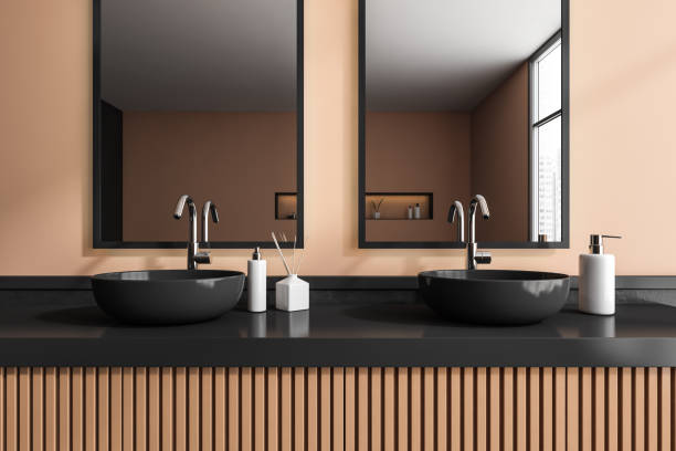 istock Bathroom interior with sink and mirror, accessories on black deck 1373424725